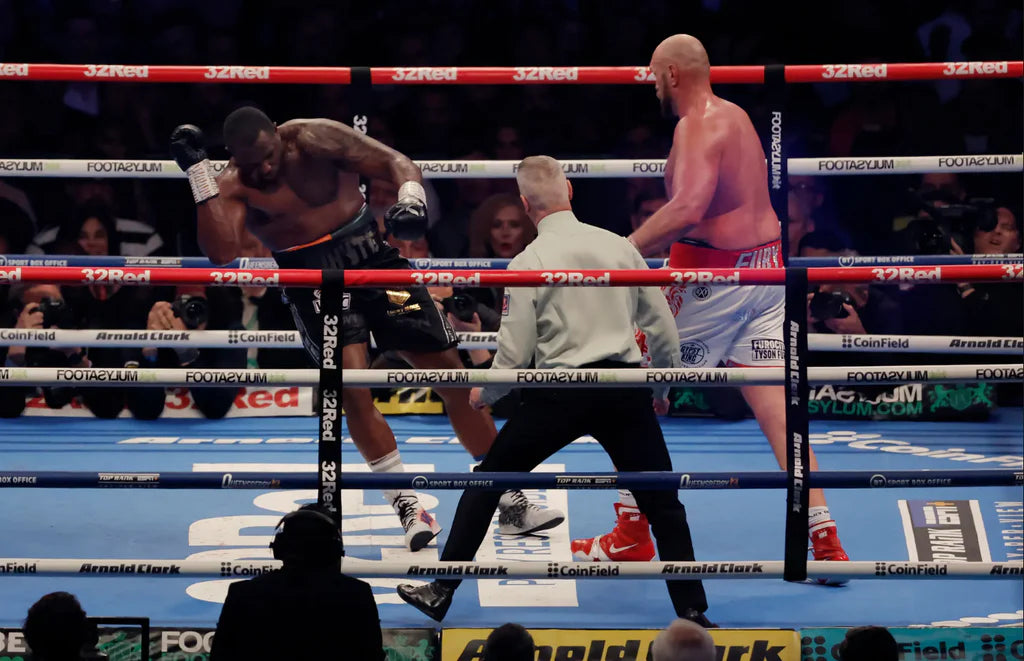 Tyson Fury fighting Dillian Whyte in a boxing match