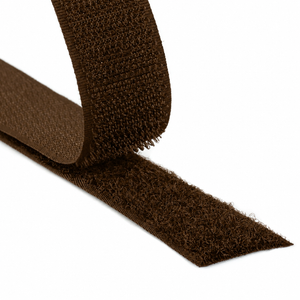 Close-up of a brown hook and loop fastener tape showing both hook and loop sides on a white background